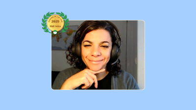 Image of Julieta Pizarro in her music studio with the Lessonface Teacher of the Year for R&B Voice badge