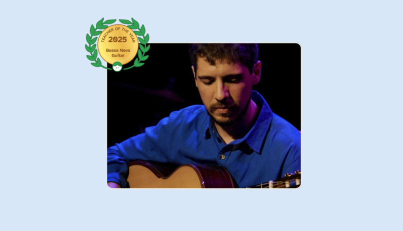 Image of João Vasconcelos playing the guitar on stage during a performance with his Lessonface Teacher of the Year in Bossa Nova Guitar badge